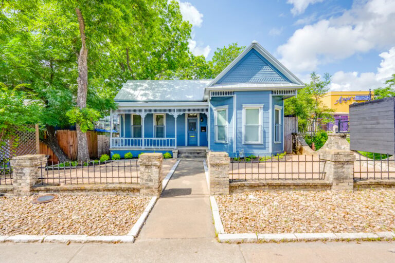 Front exterior and fenced entry at 1309 E 7th St, Austin, TX 78702