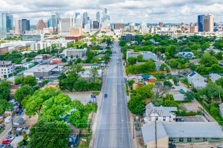 Aerial view along East 7th toward Downtown Austin at 1309 E 7th St, Austin, TX 78702