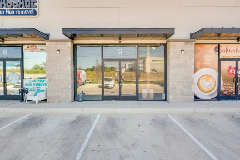 Glass storefront entrance at 14300 Ronald Reagan Blvd, Suite 304, Leander, TX 78641