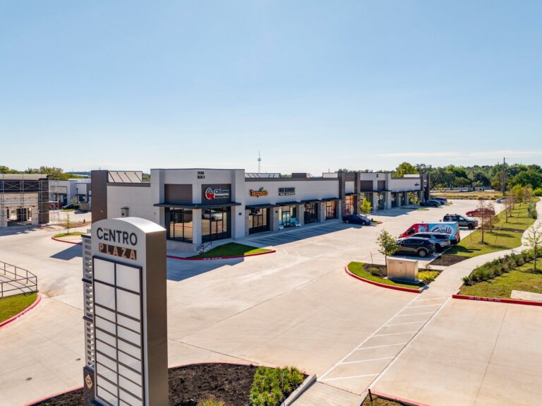 Center view with parking and signage at 14300 Ronald Reagan Blvd, Suite 304, Leander, TX 78641