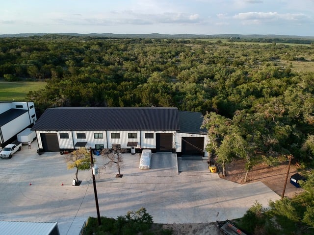 Aerial view of the property and surrounding area at 15210 Fitzhugh Rd, Austin, TX 78736