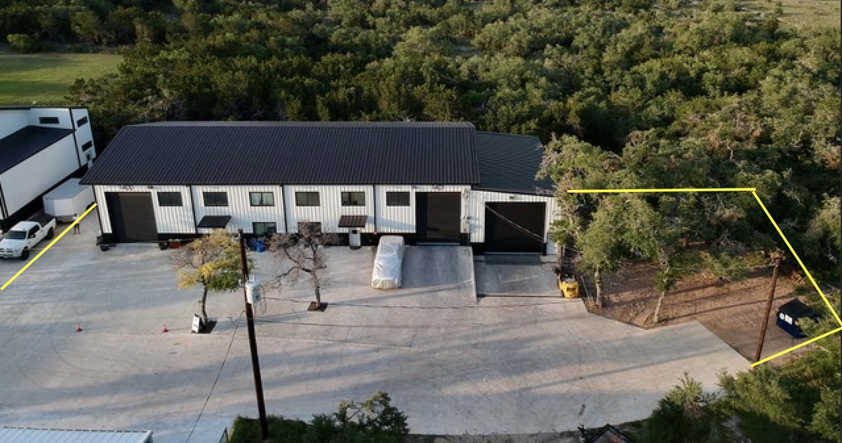 Aerial view of the flex building and drive at 15210 Fitzhugh Road, Austin
