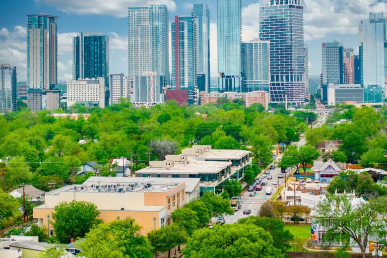 Aerial view toward the Austin skyline at 1601 E Cesar Chavez St, Unit 104, Austin, TX 78702