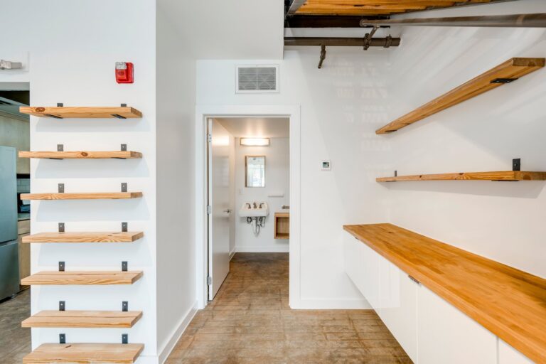 Built-in shelving and restroom access at 1601 E Cesar Chavez St, Unit 104, Austin, TX 78702