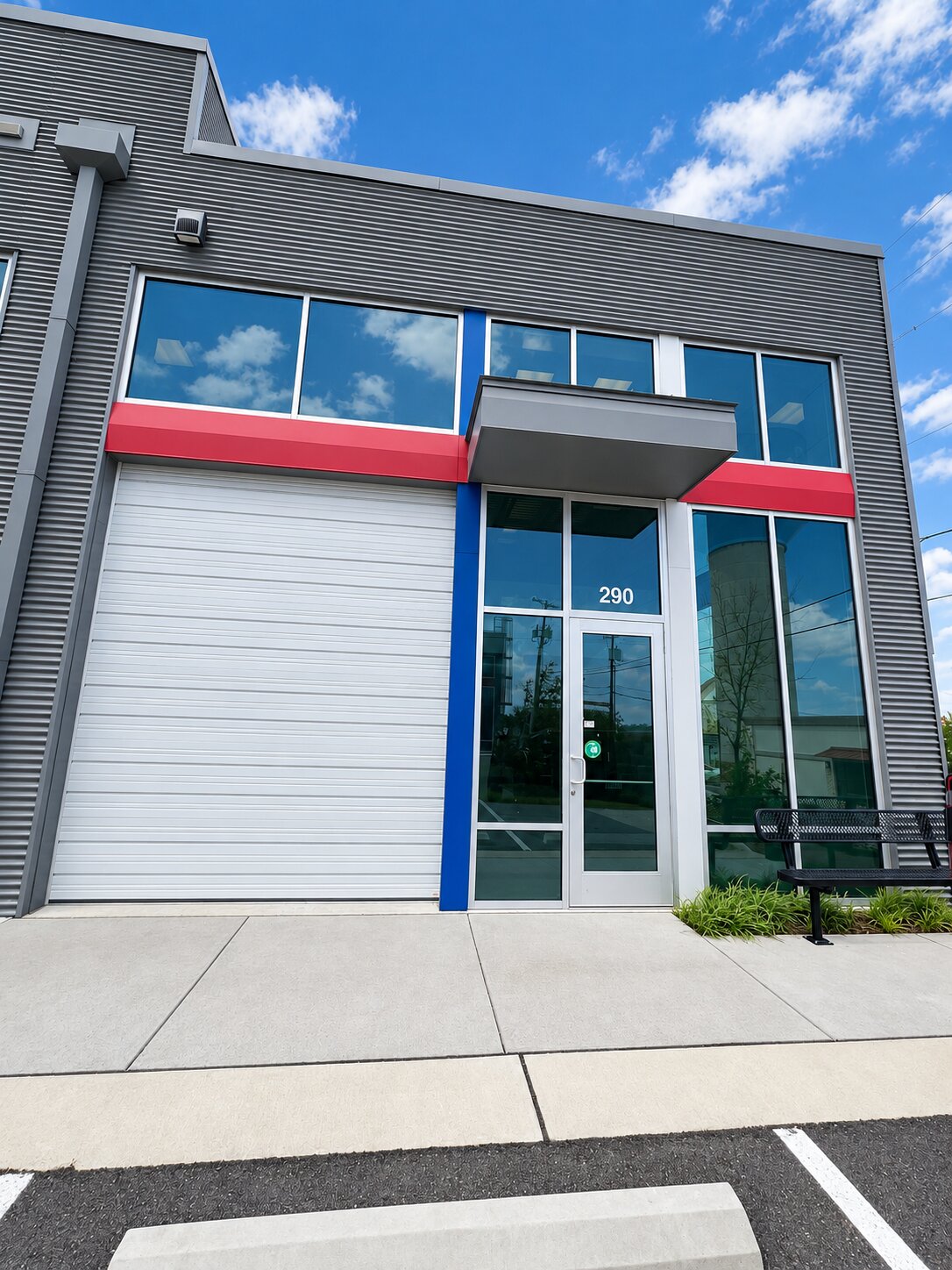 Glass storefront and grade-level door at Unit 290, 2512 West Pecan Street, Pflugerville