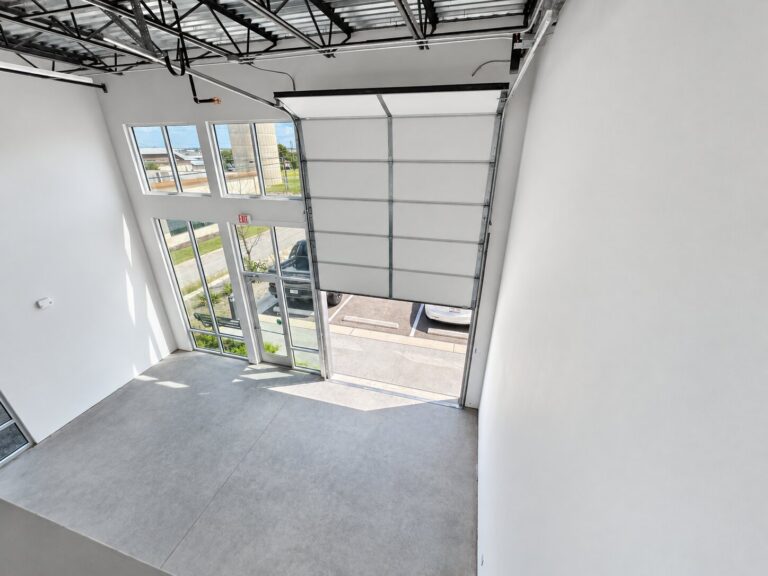Interior view toward the overhead door at 2512 W Pecan St #290, Pflugerville, TX 78660